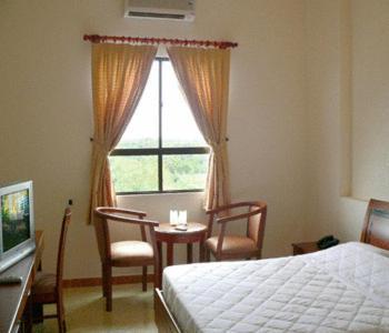 Hotel Minh Quan Bao Loc Pokoj fotografie