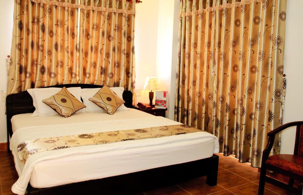 Hotel Minh Quan Bao Loc Pokoj fotografie