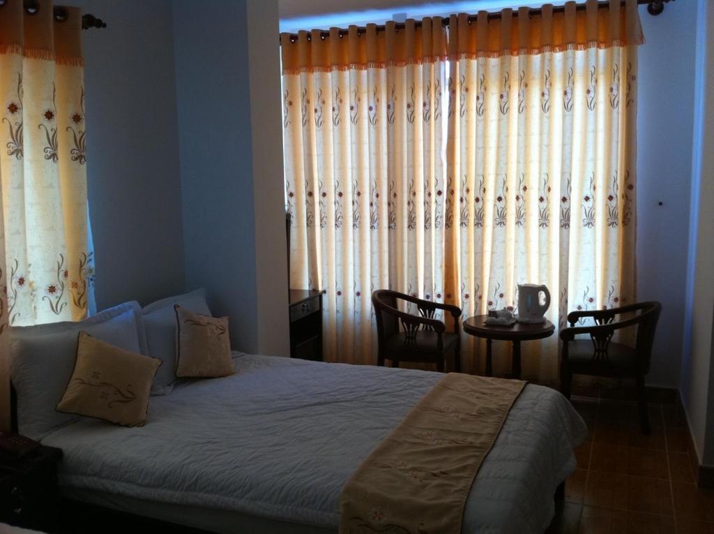 Hotel Minh Quan Bao Loc Pokoj fotografie