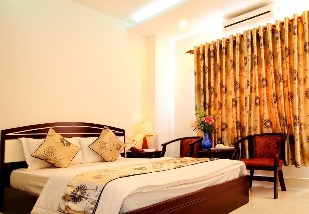 Hotel Minh Quan Bao Loc Pokoj fotografie