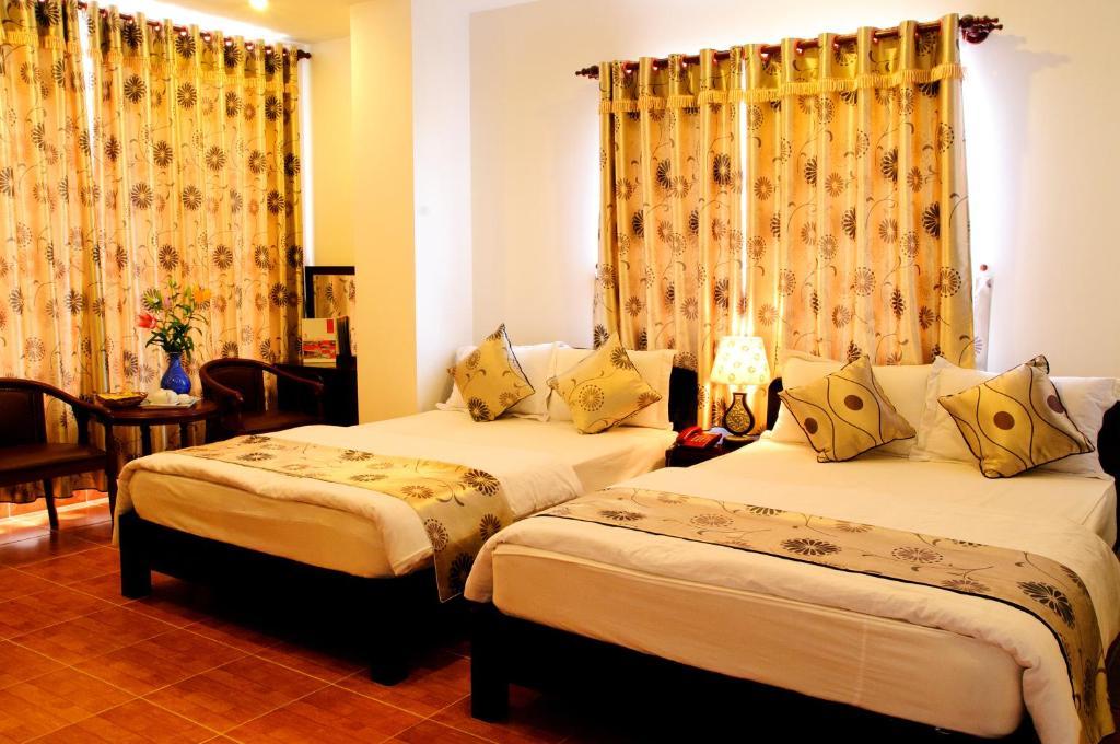 Hotel Minh Quan Bao Loc Pokoj fotografie